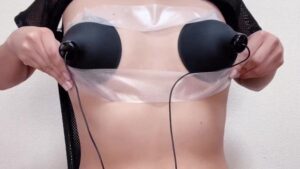 (Breastfeeding Diary #11) A transparent cup toy with a sports bra attached